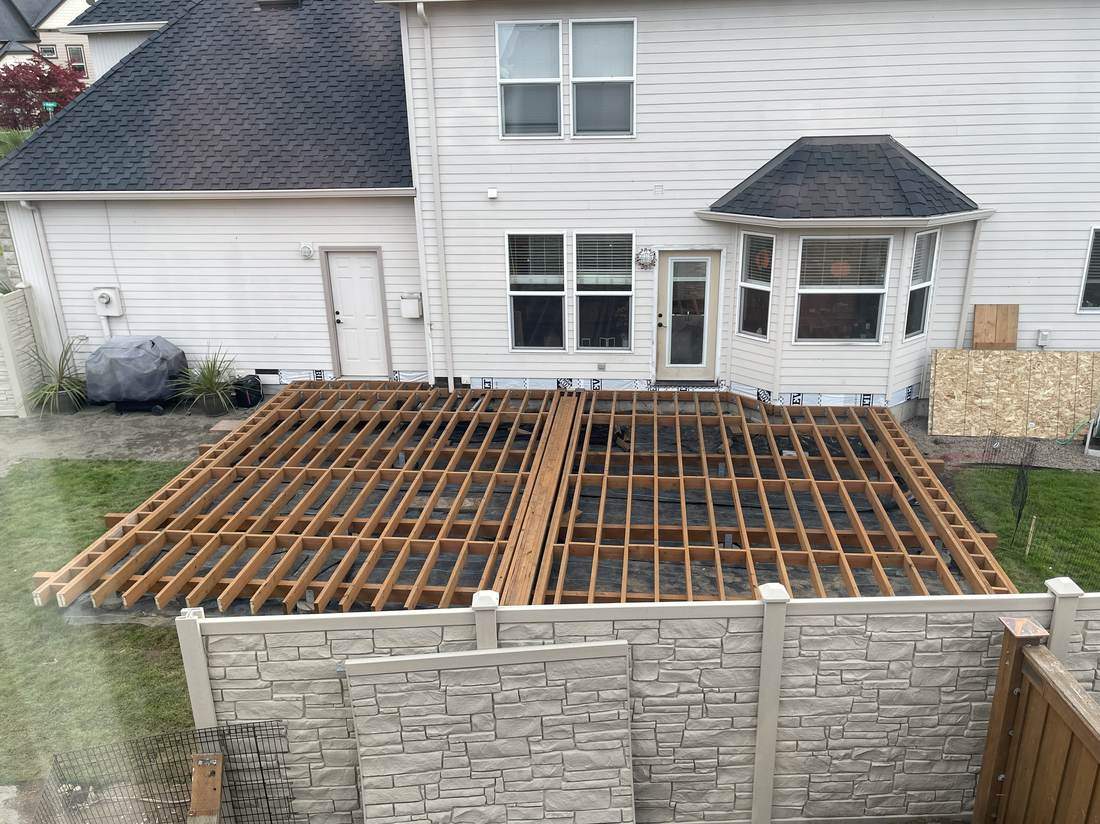 Deck framing and joists during new composite deck build