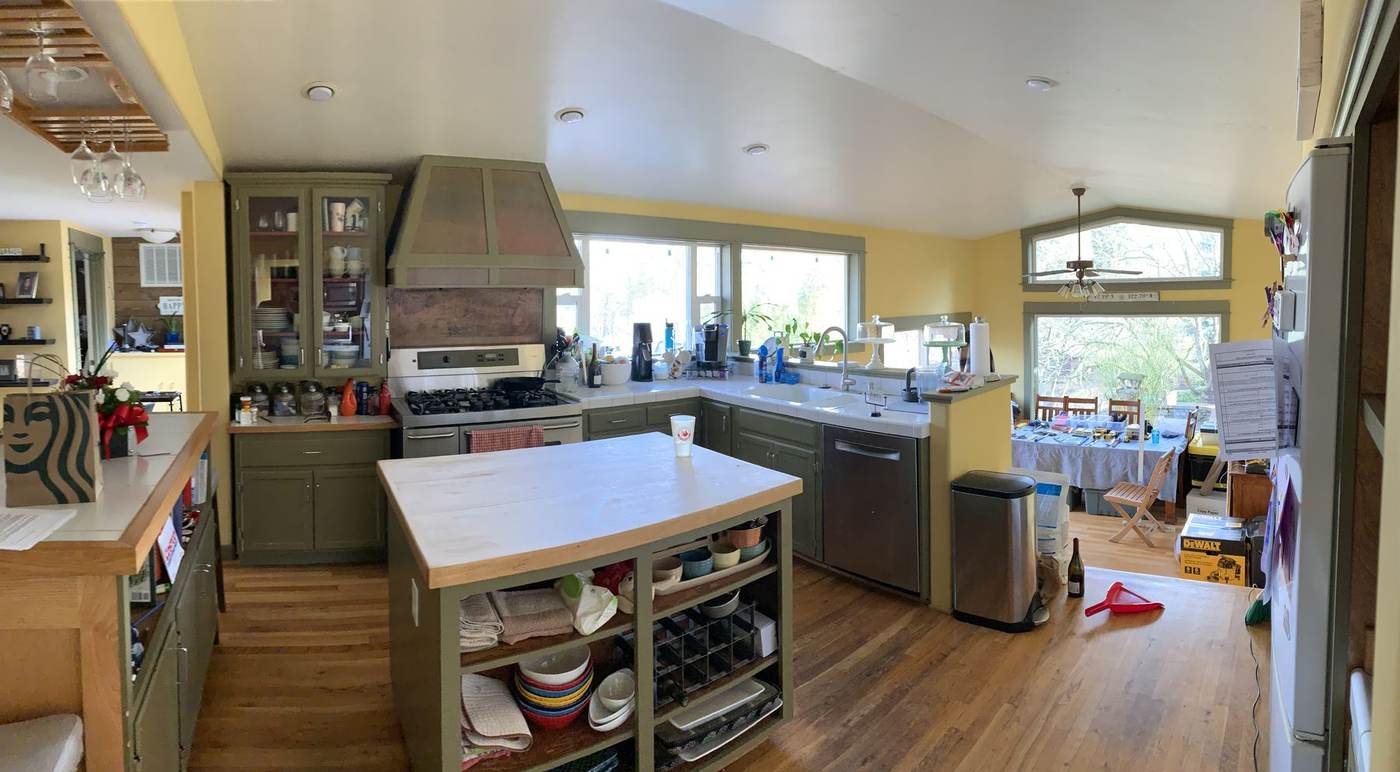 Dated kitchen with olive cabinets before remodel