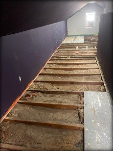 Bonus room subfloor removed exposing floor joists