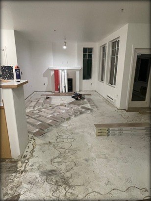 Living room subfloor before luxury vinyl plank installation