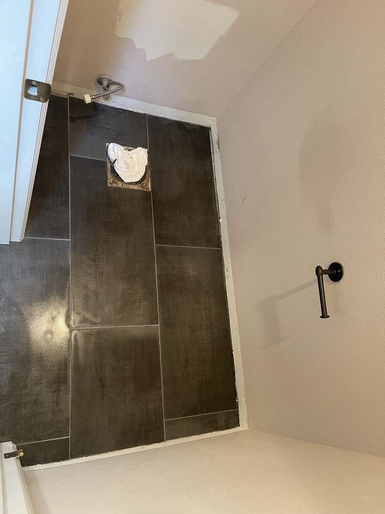 Finished heated tile floor by Gravelle Construction