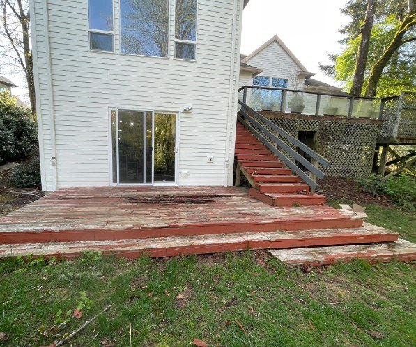 Rotted lower deck and stairs before rebuild