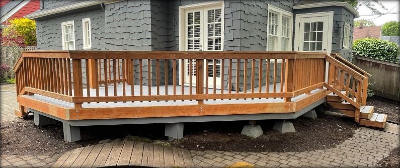 Full view of new deck and railing built by Gravelle Construction