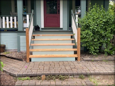New wood porch steps and railing installed, unpainted